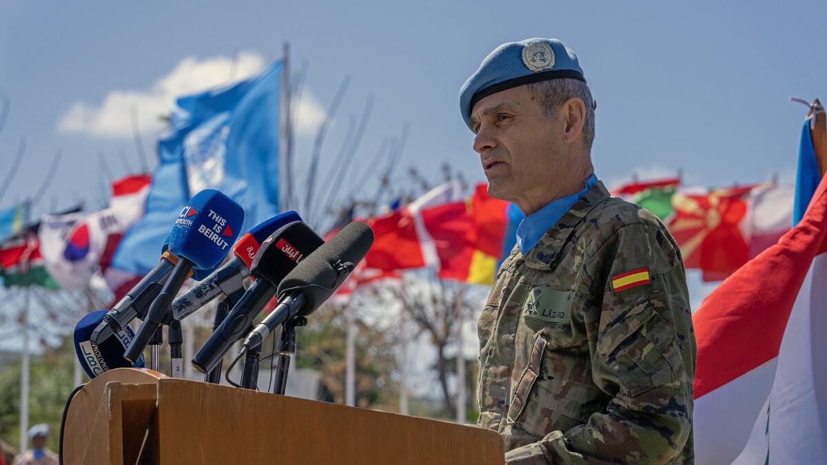 Lieutenant General Aroldo Lázaro addresses a crowd at a podium.