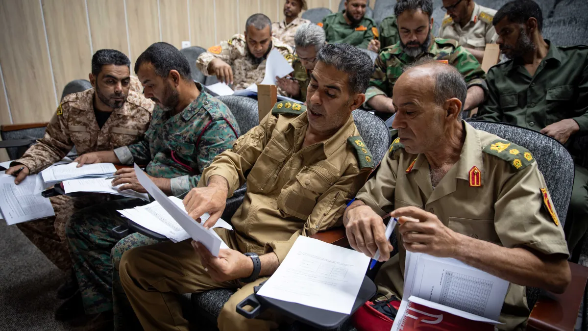 Officers learn about weapons and ammunition management in a classroom at the Ministry of Defence