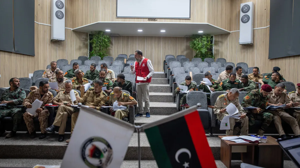 Officers learn about weapons and ammunition management in a classroom at the Ministry of Defence