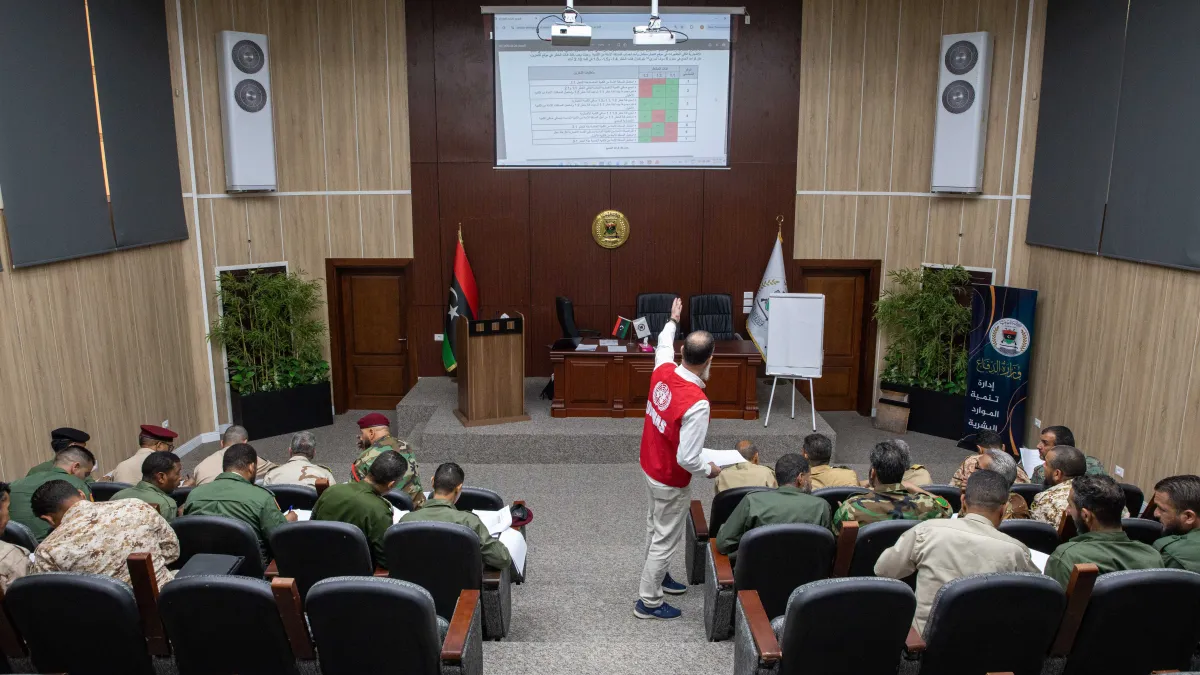 Officers learn about weapons and ammunition management in a classroom at the Ministry of Defence