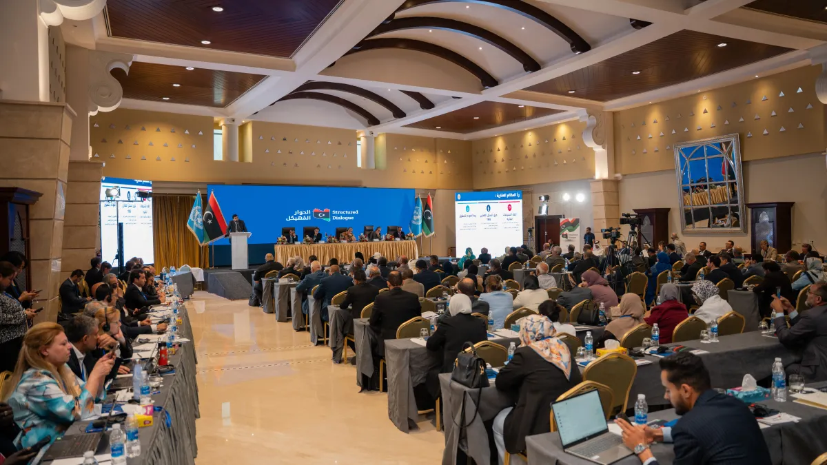 About 200 people gather to mark the completion of the final report of the Structured Dialogue, including Structured Dialogue members, diplomats, and UN staff. 