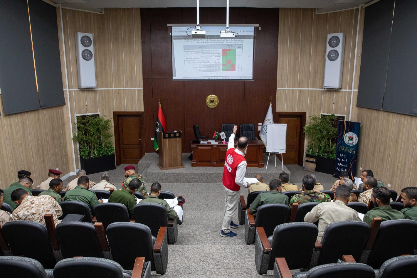 Officers learn about weapons and ammunition management in a classroom at the Ministry of Defence