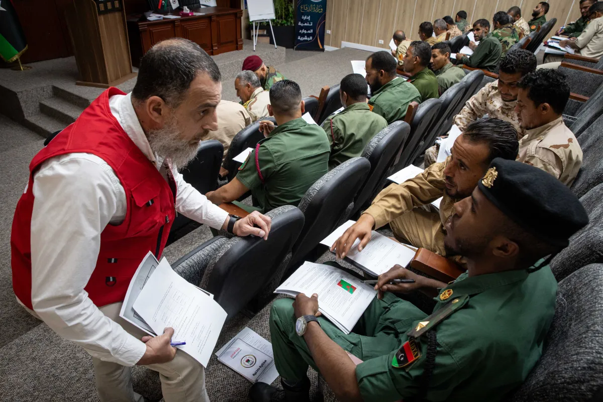 Officers learn about weapons and ammunition management in a classroom at the Ministry of Defence