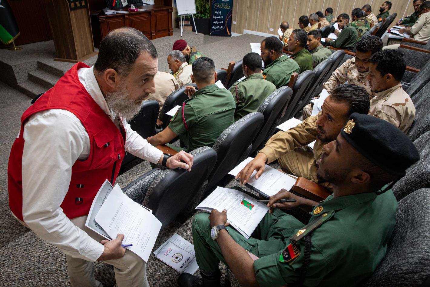 Officers learn about weapons and ammunition management in a classroom at the Ministry of Defence