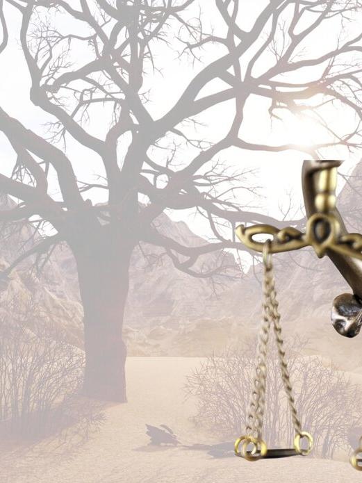The symbol of Justice with an image of the desert in the background